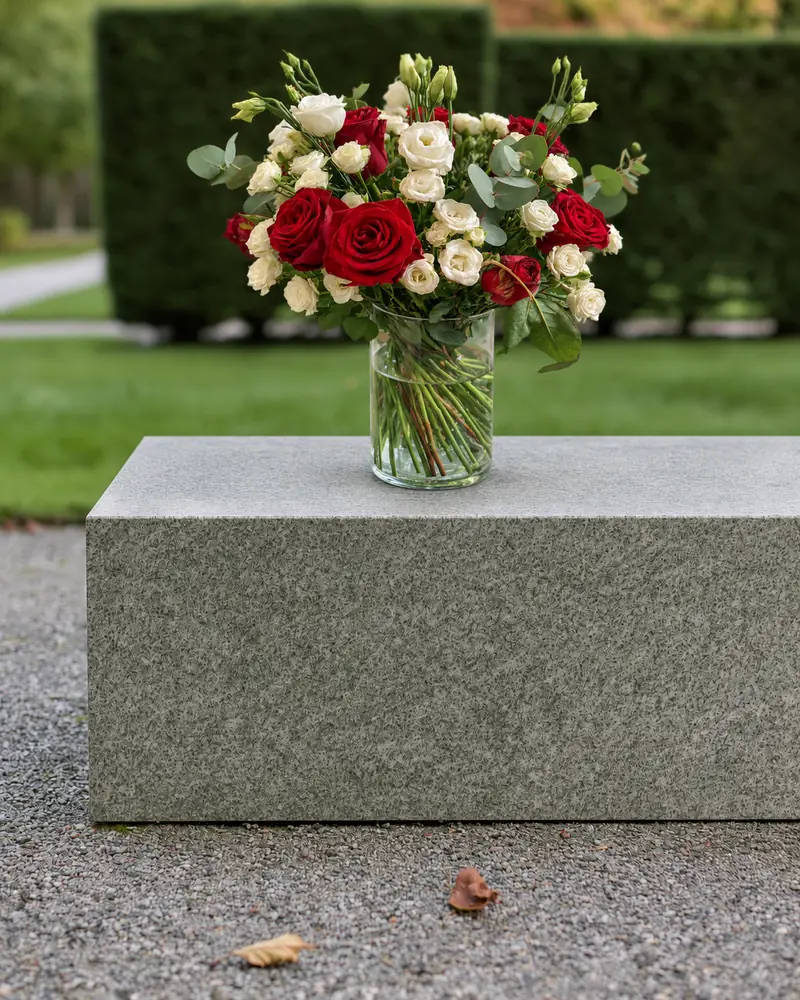 Example with sample flowers: a vase arrangement in the Granite plinth · quiet garden room, kept as made