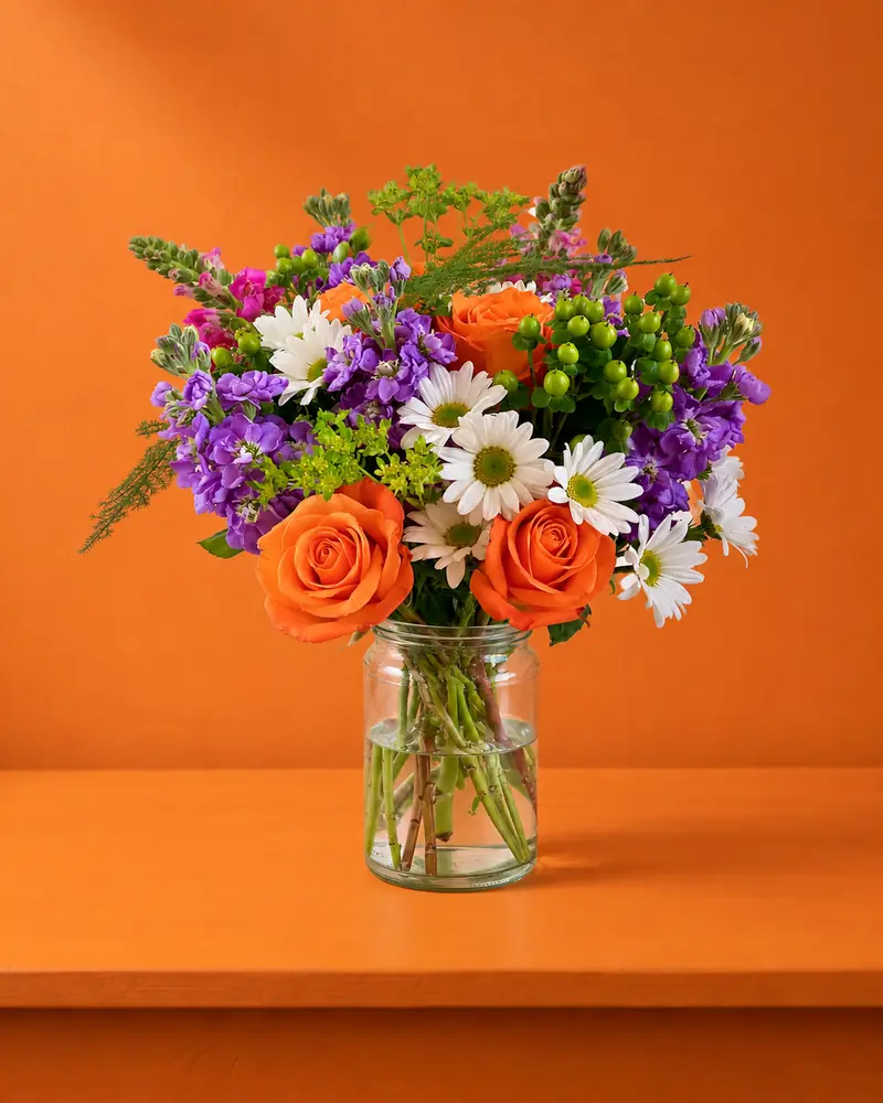Example with sample flowers: a vase arrangement in the Colour studio · tangerine room, kept as made