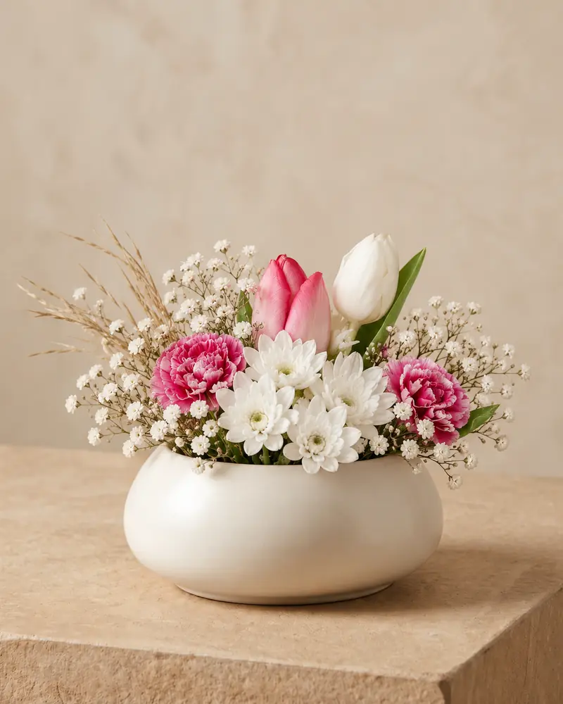 Example with sample flowers: a wrapped bouquet in the Florist vase · ivory ceramic bowl room, moved into our vase